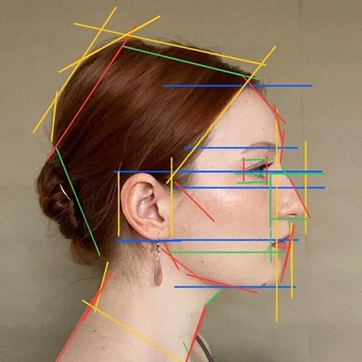 Profile portrait of Emily Olshevski with colorful geometric line overlays